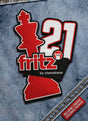 Logotyp för Fritz 21 schackprogrammet från ChessBase broderat på denim.