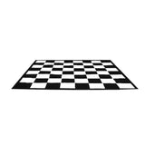 Underlaget för jätteschack som kan spelas på campingen, skolgården och många andra platser