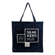 Stor tygpåse i bomull med schackhusets logotyp tryckt på den