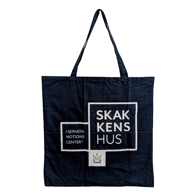 Stor tygpåse i bomull med schackhusets logotyp tryckt på den